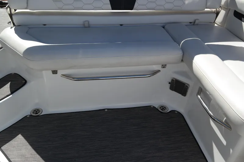 Slide: The Image of Interior seating of 2022 Four Winns HD3 boat with white upholstery and sleek design. - 15