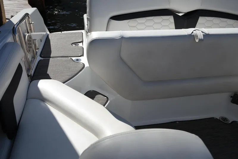 Slide: The Image of Interior seating of 2022 Four Winns HD3 boat, featuring sleek, modern design. - 18