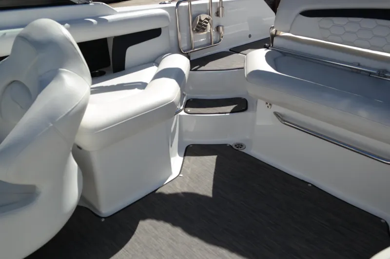 Slide: The Image of Interior of 2022 Four Winns HD3 boat with white seating and modern design. - 19