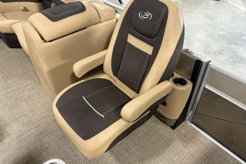 Slide: The Image of Luxurious seating in 2025 Barletta C22QC boat, featuring beige and black upholstery. - 16