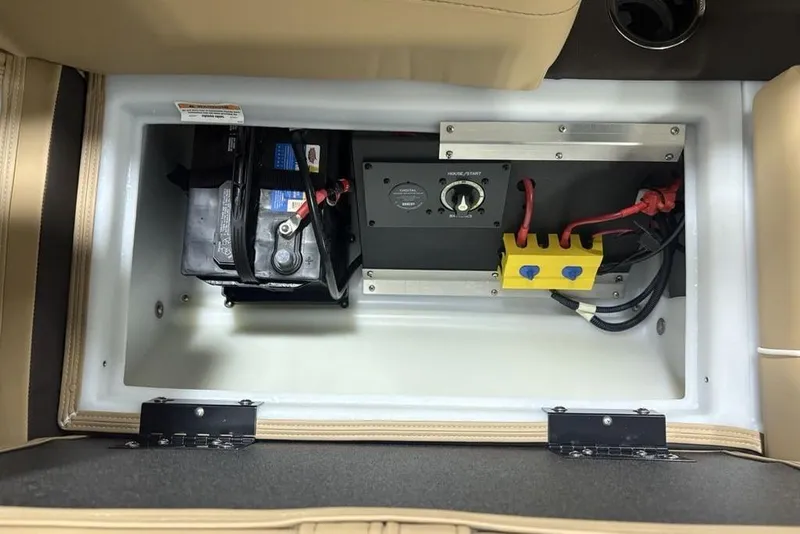 Slide: The Image of 2025 Barletta C22QC battery compartment with wiring and control panel. - 26