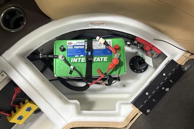 Slide: The Image of 2025 Barletta C22QC boat battery compartment with Interstate dual-purpose battery. - 30