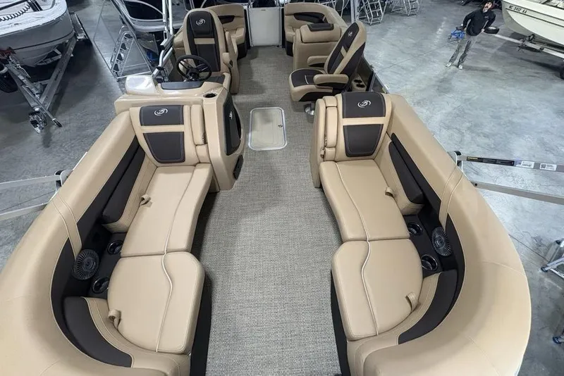 Slide: The Image of 2025 Barletta C22QC pontoon boat interior with luxurious beige seating and modern design. - 33