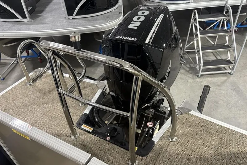 Slide: The Image of 2025 Barletta C22QC boat with Mercury 200 engine and stainless steel railing. - 35