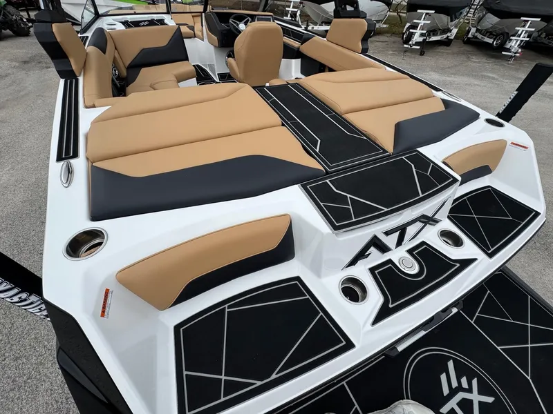 Slide: The Image of 2025 ATX Surf Boats 20 Type-S with tan and black seating, sleek design. - 6