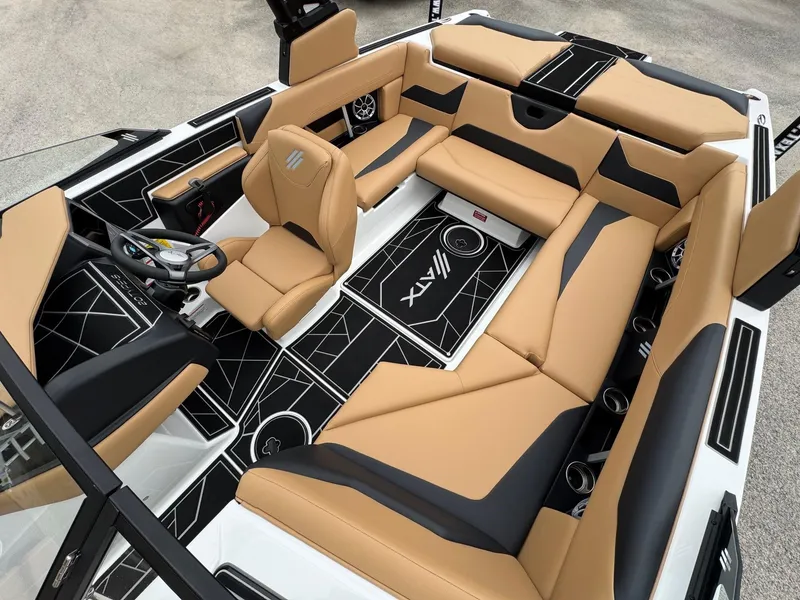 Slide: The Image of Luxurious interior of 2025 ATX Surf Boats 20 Type-S with tan and black seating. - 9