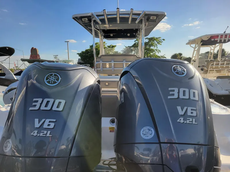 Slide: The Image of 2022 Key West 263 FS boat with dual Yamaha 300 V6 engines. - 17