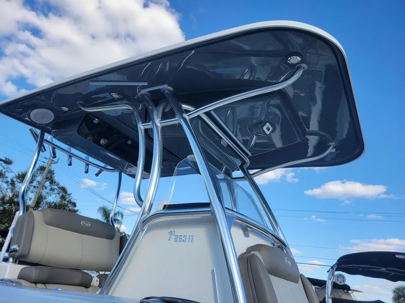 Slide: The Image of 2022 Key West 263 FS boat with sleek T-top and comfortable seating. - 2
