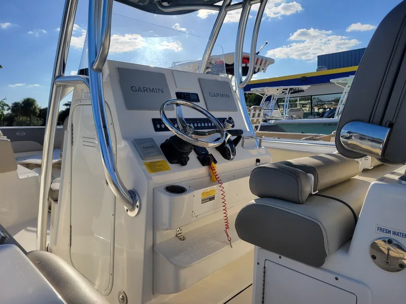 Slide: The Image of 2022 Key West 263 FS boat dashboard with Garmin navigation system. - 5