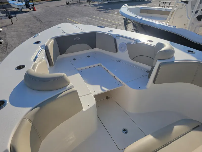 Slide: The Image of 2022 Key West 263 FS boat with spacious seating and modern design. - 8