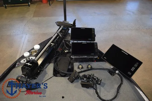 Slide: The Image of 2023 Bass Cat Puma STS boat dashboard with advanced navigation and control systems. - 10