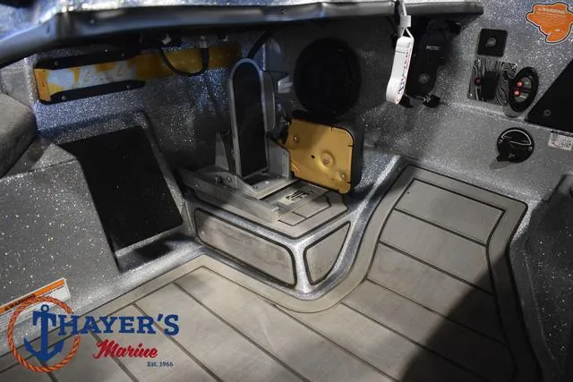 Slide: The Image of 2023 Bass Cat Puma STS boat interior with Thayer's Marine logo. - 22
