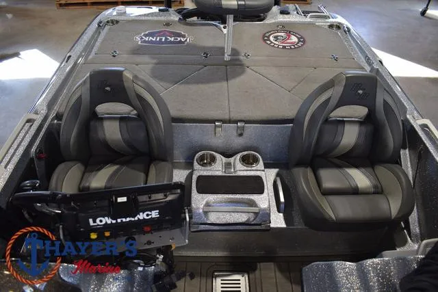 Slide: The Image of 2023 Bass Cat Puma STS interior with dual seats and Lowrance electronics. - 24