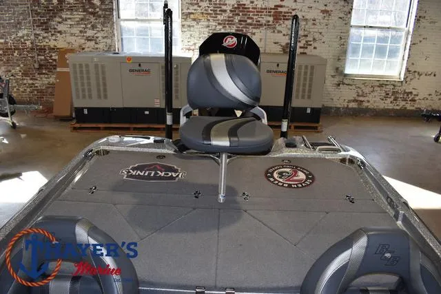 Slide: The Image of 2023 Bass Cat Puma STS boat interior with fishing seat and branded decals. - 25