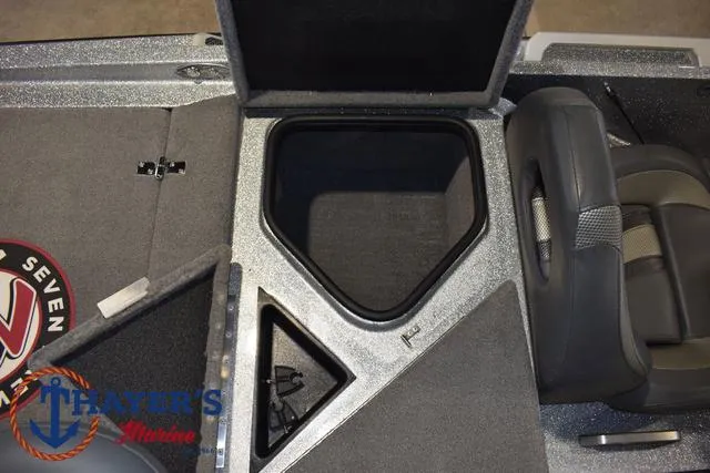 Slide: The Image of 2023 Bass Cat Puma STS boat interior storage compartments and seating. - 26