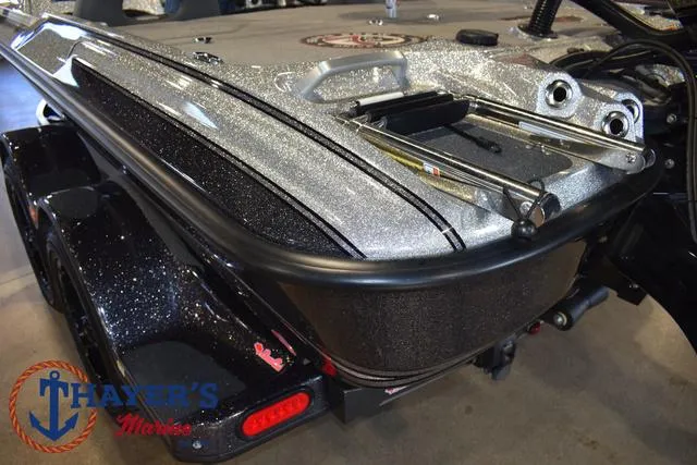 Slide: The Image of 2023 Bass Cat Puma STS boat rear view with metallic finish at Thayer's Marine. - 33