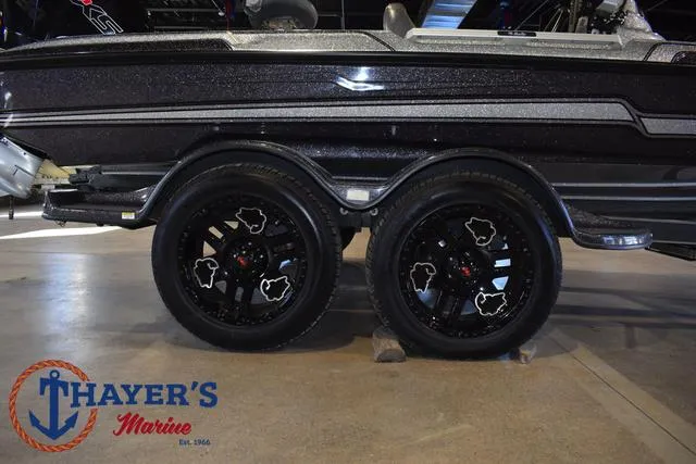 Slide: The Image of 2023 Bass Cat Puma STS boat trailer with custom black wheels at Thayer's Marine. - 4