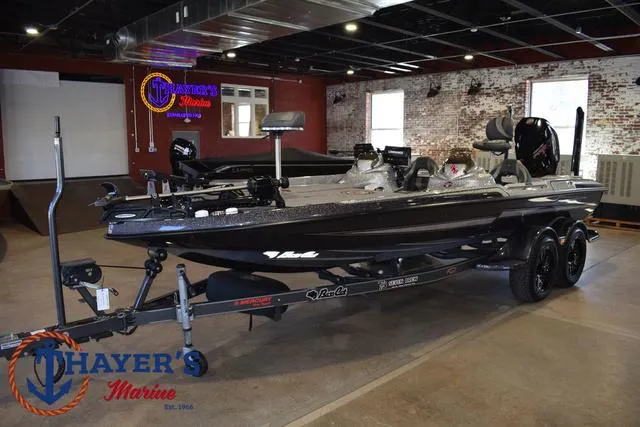 Slide: The Image of 2023 Bass Cat Puma STS boat on trailer in showroom. - 6