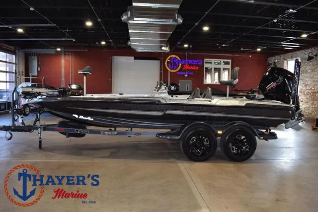Slide: The Image of 2023 Bass Cat Puma STS boat in showroom at Thayer's Marine. - 7