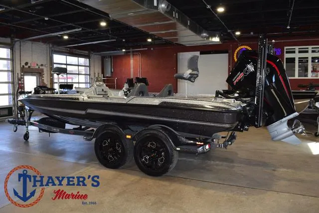 Slide: The Image of 2023 Bass Cat Puma STS boat in showroom at Thayer's Marine. - 8