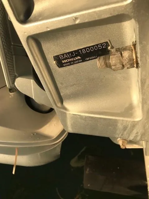 Slide: The Image of Close-up of a 1998 Boston Whaler 260 Outrage engine part with serial number. - 33