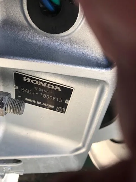 Slide: The Image of Close-up of a Honda BF225A engine label on a 1998 Boston Whaler 260 Outrage. - 34
