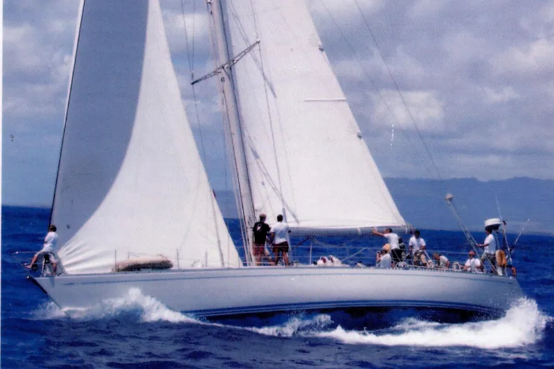 The Image of 1983 Nautor Swan 651 sailing yacht on open sea with crew. - 0