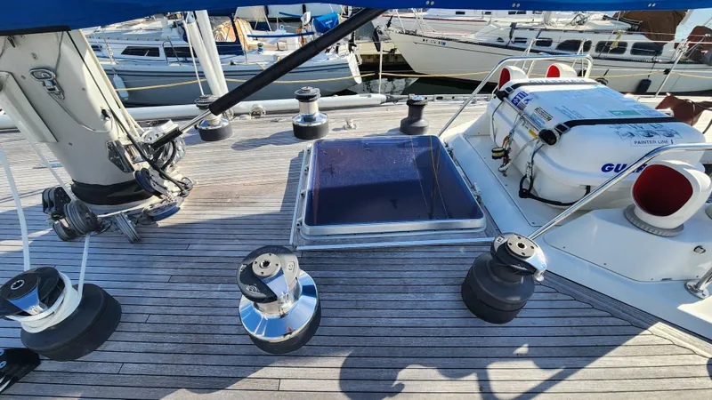 Slide: The Image of Deck of 1983 Nautor Swan 651 yacht with winches and hatch. - 10