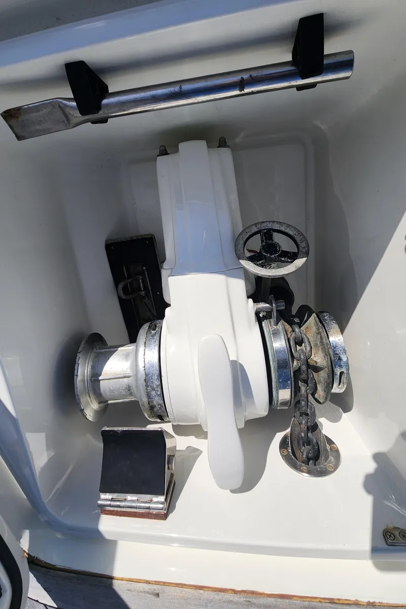 Slide: The Image of Anchor windlass on 1983 Nautor Swan 651 yacht, featuring polished metal components. - 19