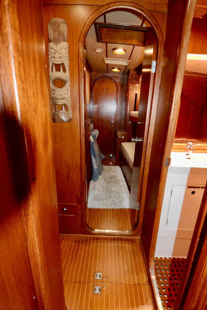 Slide: The Image of Interior of 1983 Nautor Swan 651 yacht with wooden paneling and mirror. - 31