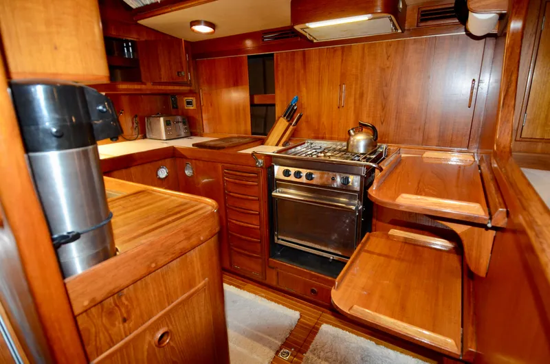Slide: The Image of Luxurious wooden kitchen interior of 1983 Nautor Swan 651 yacht. - 39