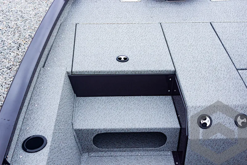 Slide: The Image of 2025 G3 Sportsman 1810 boat deck with storage compartments. - 18