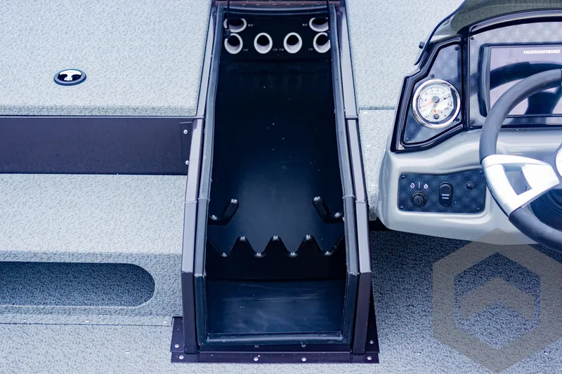 Slide: The Image of 2025 G3 Sportsman 1810 boat interior with steering wheel and storage compartment. - 19