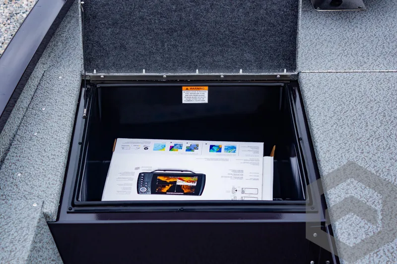 Slide: The Image of Storage compartment of 2025 G3 Sportsman 1810 boat with electronic device box inside. - 22