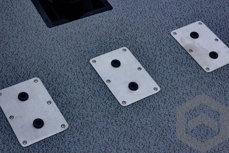 Slide: The Image of 2025 G3 Sportsman 1810 boat deck with metal plates and textured surface. - 30