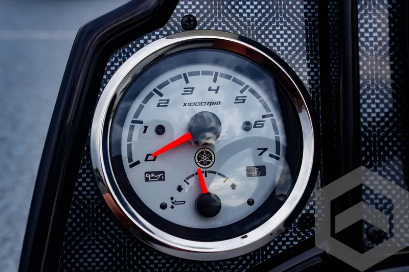 Slide: The Image of Tachometer of 2025 G3 Sportsman 1810, displaying RPM and oil indicators. - 39