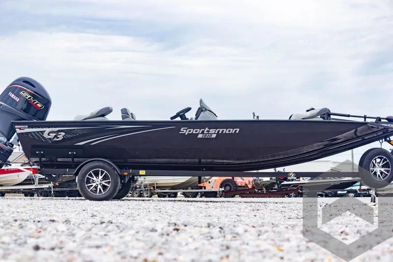 Slide: The Image of 2025 G3 Sportsman 1810 boat on trailer, side view, outdoors. - 4