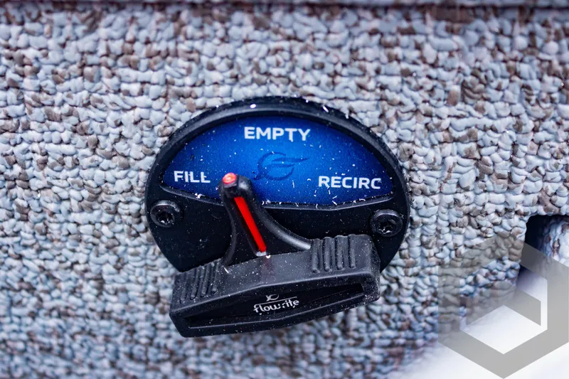 Slide: The Image of 2025 G3 Sportsman 1810 boat control panel with flow-rite valve for fill, recirculate, and empty functions. - 43