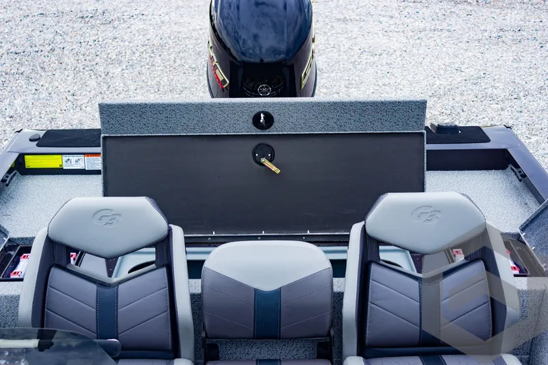 Slide: The Image of 2025 G3 Sportsman 1810 boat interior with seating and motor. - 46