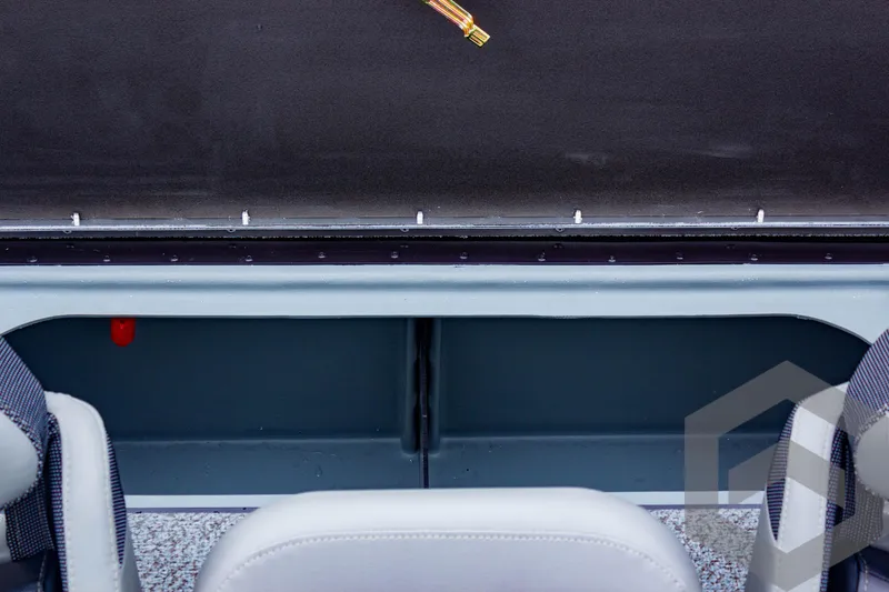 Slide: The Image of Interior view of 2025 G3 Sportsman 1810 boat, featuring seating and storage area. - 49