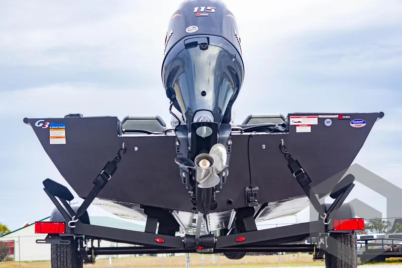 Slide: The Image of 2025 G3 Sportsman 1810 boat rear view with powerful outboard motor. - 6