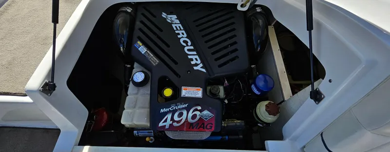 Slide: The Image of Engine compartment of a 2006 Cobalt 240 boat with MerCruiser 496 MAG engine. - 12