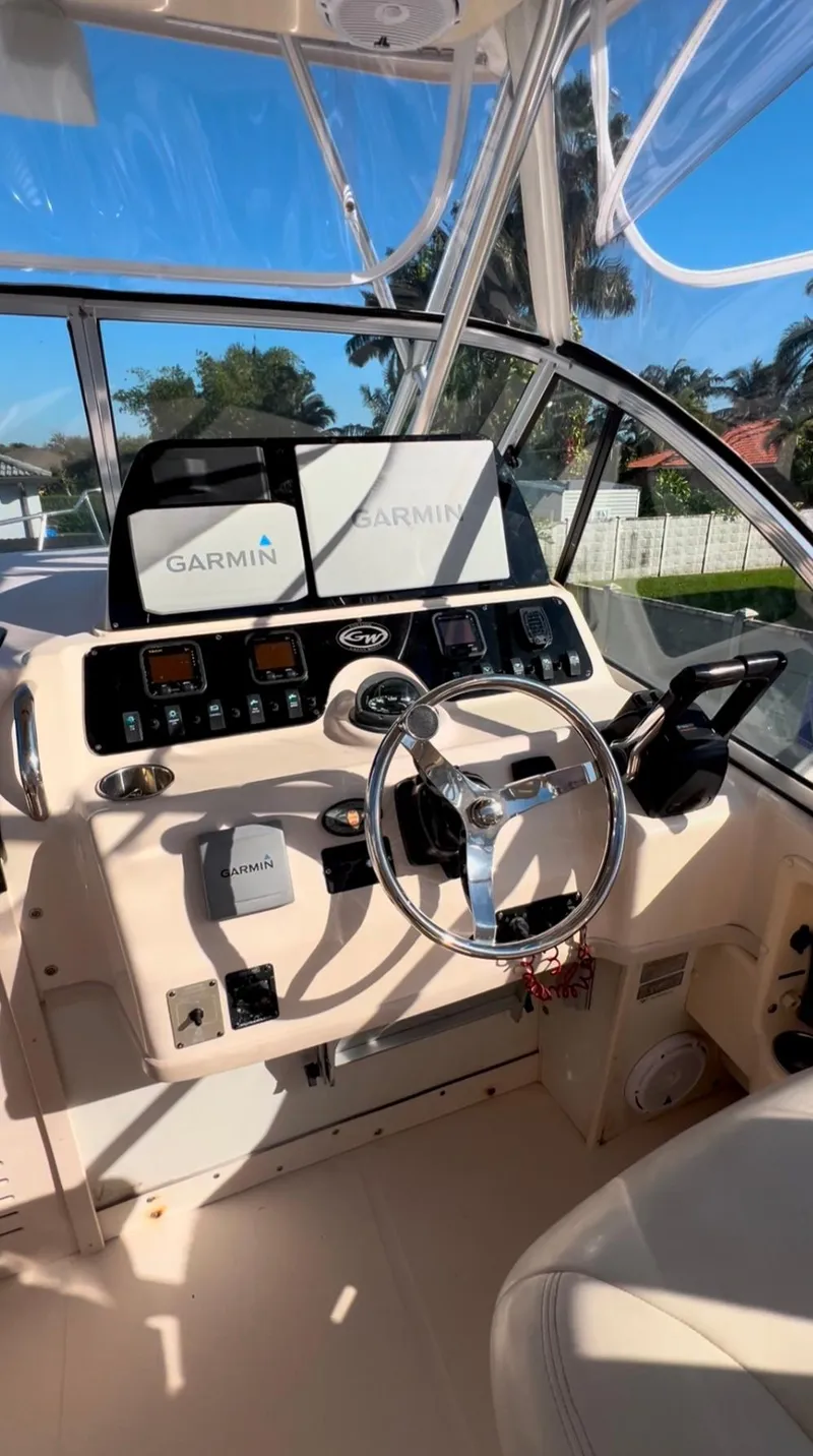 Slide: The Image of 2006 Grady-White 282 Sailfish boat helm with Garmin navigation system. - 10