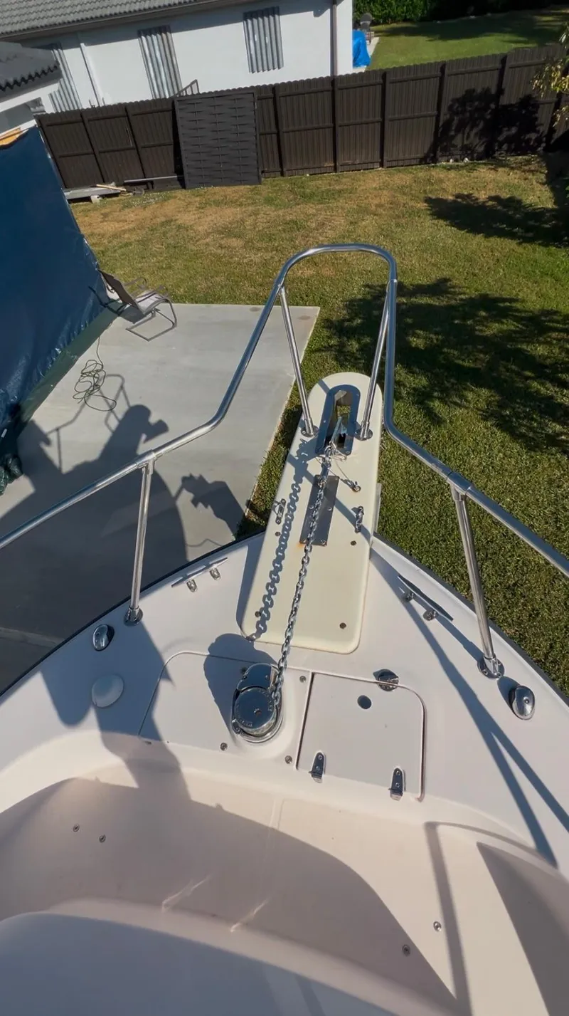 Slide: The Image of 2006 Grady-White 282 Sailfish boat bow with anchor and chain. - 16