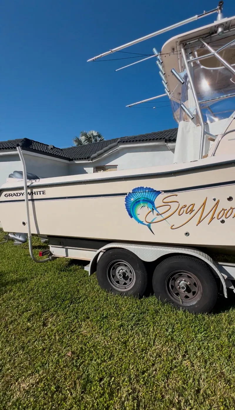 Slide: The Image of 2006 Grady-White 282 Sailfish boat on trailer, side view, sunny day. - 22