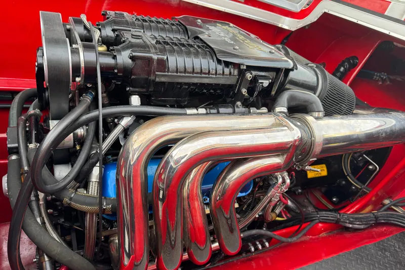 Slide: The Image of High-performance engine of a 2010 Nor-Tech 4000 Roadster with polished exhaust headers. - 10