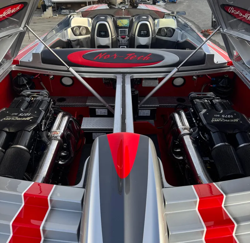 Slide: The Image of 2010 Nor-Tech 4000 Roadster engine view, showcasing powerful dual engines and sleek design. - 12