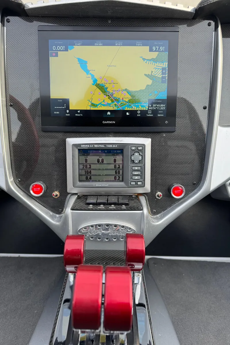 Slide: The Image of Dashboard of a 2010 Nor-Tech 4000 Roadster with navigation and control systems. - 21