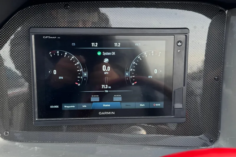 Slide: The Image of Garmin GPS display in 2010 Nor-Tech 4000 Roadster showing speed and RPM gauges. - 22