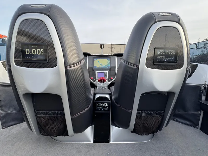 Slide: The Image of 2010 Nor-Tech 4000 Roadster cockpit with dual seats and digital displays. - 23